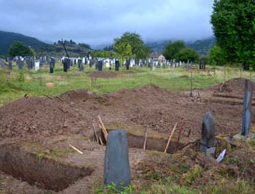 Эксгумация тел чеченцев, погибших в ущелье Лопота. Фото: информационно-аналитическое агентство
"ГРУЗИНФОРМ", www.saqinform.ge