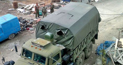 Сотрудники силовых структур в поселке Временный Унцукульского района. 24 сентября 2014 г. Фото предоставлено жителями поселка Временный