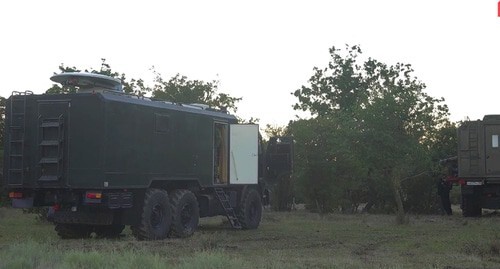 Спецтехника во время проведения КТО силовиками в лесу неподалеку от села Талги. Кадр видео: Национальный антитеррористический комитет Спецтехника во время проведения КТО силовиками в лесу неподалеку от села Талги. Кадр видео: Национальный антитеррористический комитет